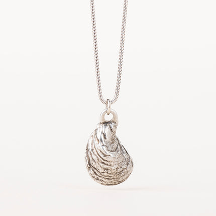 Silver Oyster Shell Necklace with a pendant molded from a real oyster shell, featuring outer shell detail