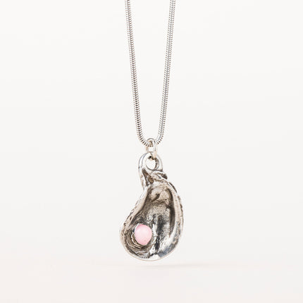 Silver Oyster Shell Necklace with a pendant molded from a real oyster shell, featuring delicate pink pearl-like decorations. The pendant hangs on a 29-inch chain