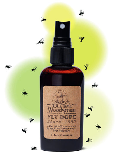 a bottle of ole time woodsman fly dope against a white background with illustrations of black flies around the bottle