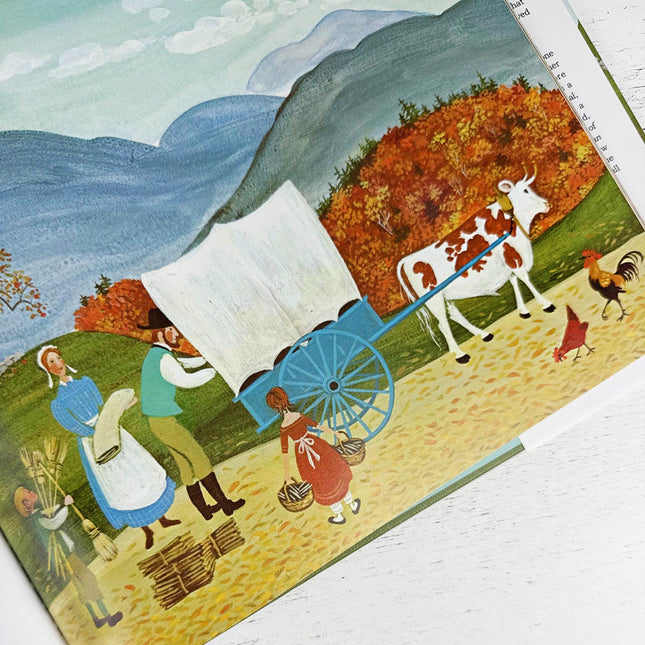 Illustration of a covered wagon with people and animals in a scenic landscape