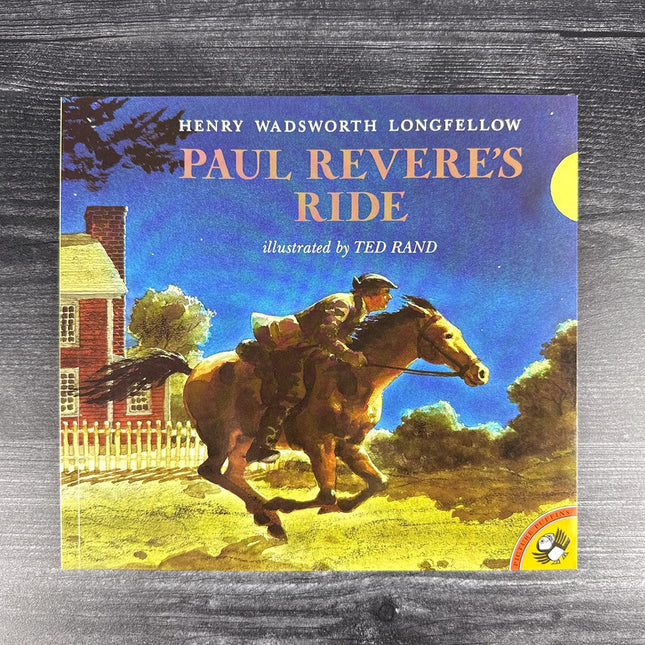 Book cover of 'Paul Revere's Ride' by Henry Wadsworth Longfellow with illustration of a person on a horse.
