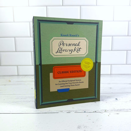 Knock Knock's Personal Library Kit on a white wooden surface with a white tiled wall background