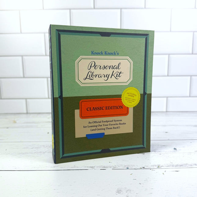 Knock Knock's Personal Library Kit on a white wooden surface with a white tiled wall background
