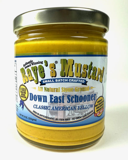 Jar of Raye's Mustard with a gold lid on a white background
