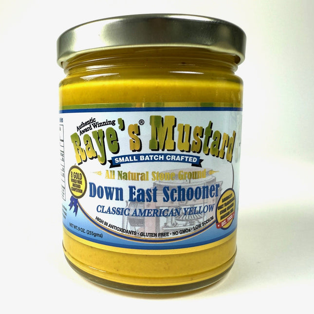 Jar of Raye's Mustard with a gold lid on a white background