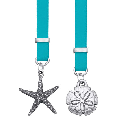 A turquoise ribbon bookmark with pewter starfish and sand dollars on each end