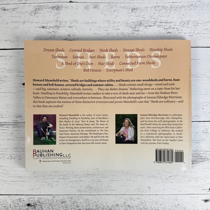 Back cover of Sheds with text and images on a wooden surface