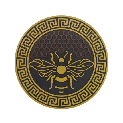 garden stepping stone with bee design and honeycomb background in yellow and brown