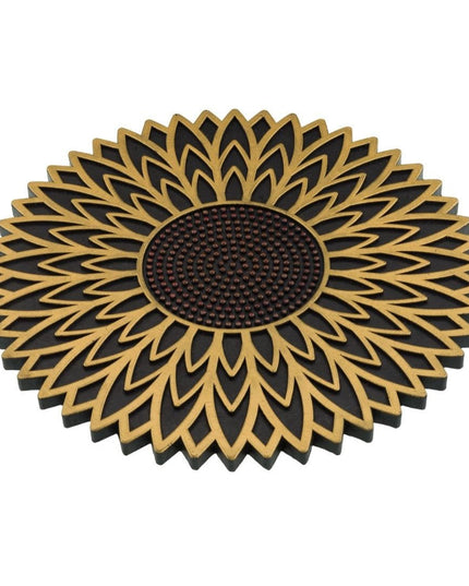 garden stepping stone with sunflower design in yellow and brown shown at a slight angle