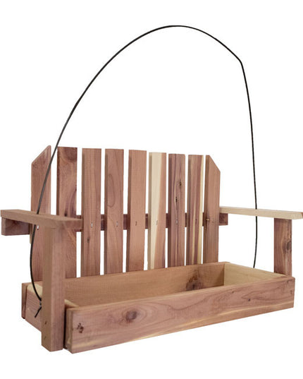 the cedar swing bird feeder against a white background