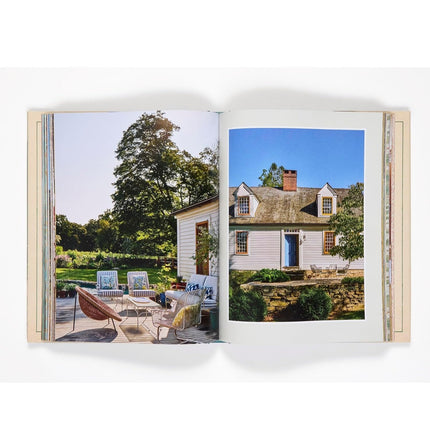 Open book showing images of a house and outdoor seating area.