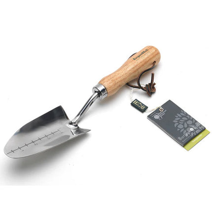 the stainless steel transplanter against a white background