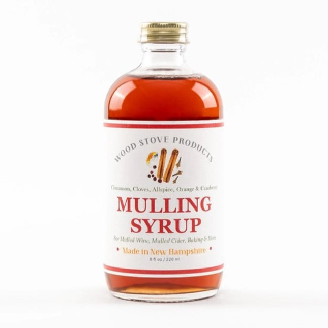 8oz mulling syrup bottle showing the warm colored amber liquid inside