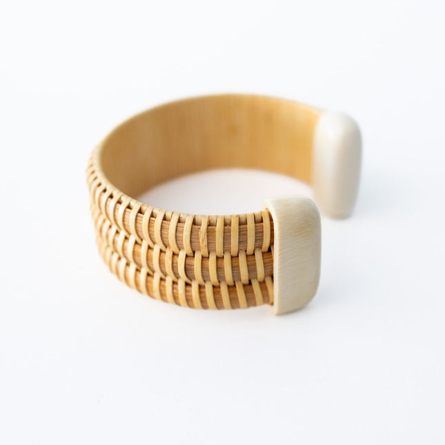 Woven wooden bracelet on a white background