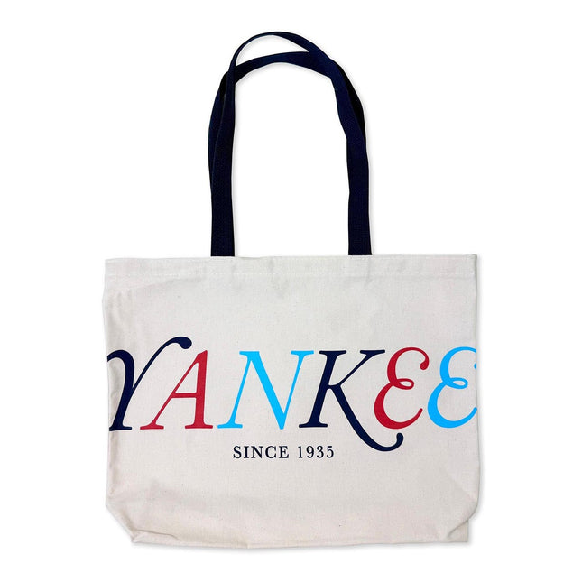canvas Tote bag with navy blue straps and 'YANKEES SINCE 1935' in navy, cyan, and red text on a white background