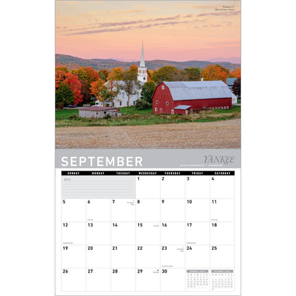 A single-page September calendar from Yankee Paper Products, featuring a scenic autumn farm landscape with a red barn, white church, and colorful fall trees above a monthly calendar grid.