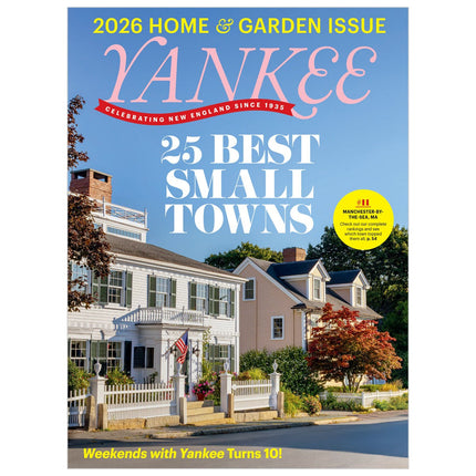 Yankee magazine cover featuring a small town with a blue sky and trees.