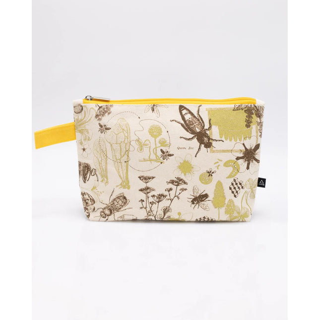 a white canvas zipper pouch with vintage illustrations and scientific diagrams of honey bees. the pouch has a yellow strap for easy carrying