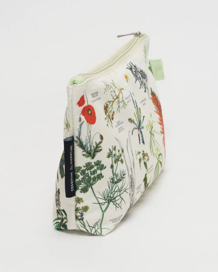 a side angle of white canvas zipper pouch with vintage illustrations of medicinal plants