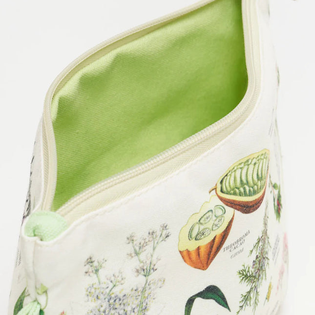 a close up of the medicinal botany zipper pouch showing the pouch unzipped revealing the solid spring green lining