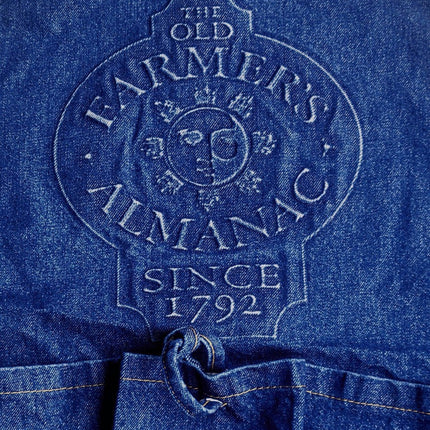 a close up of the deeply embossed old farmer's almanac logo on the gathering apron