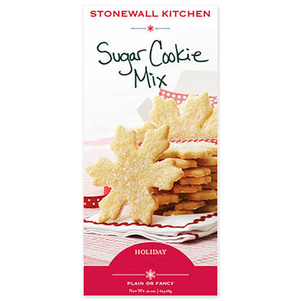 a white box of sugar cookie mix with images of sugar cookies in the shape of festive snowflakes on the box