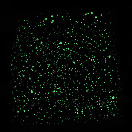 Glowing green stars on a black background