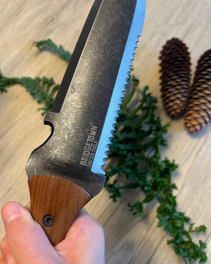 Essential Hori Hori knife held in a hand
