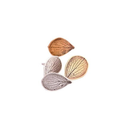 two pairs of hydrangea petal shaped earrings in brass and silver on a white background