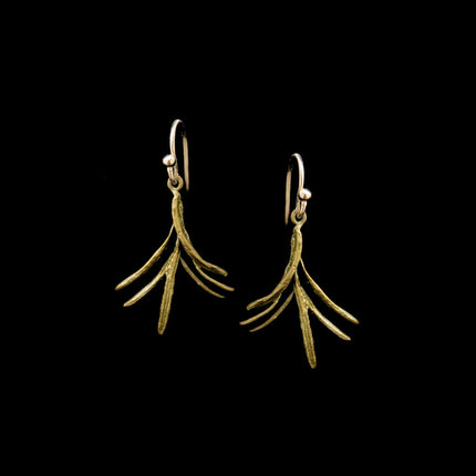 cast bronze sprigs of rosemary hanging from gold earring wire