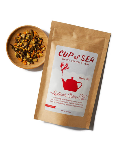 a kraft tea package with a white and red label that reads "Cup of Sea - Maine Seaweed Teas - Sailor's Cure-All" with a graphic of a solid red tea kettle with seaweed shaped steam rising out of the spout next to a small round bowl filled with loose leaf tea