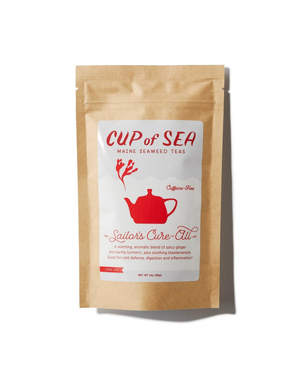 a kraft tea package with a white and red label that reads "Cup of Sea - Maine Seaweed Teas - Sailor's Cure-All" with a graphic of a solid red tea kettle with seaweed shaped steam rising out of the spout
