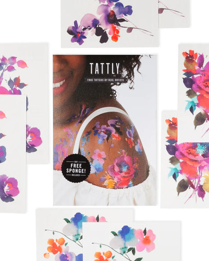 the whole set of 8 tattoos of the in bloom tattoo set - each is vividly colorful and painterly in style, surrounding the package for the set