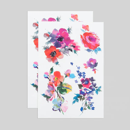 2 full sheets of the watercolor florals temporary tattoo sheets showing all of the flowers on the sheet